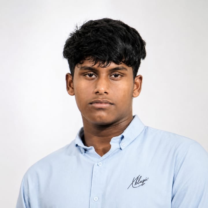 Muhammed Ajlan (Muhammad Ajlan), founder of Navora, in a light blue button-down shirt against a plain light grey backdrop